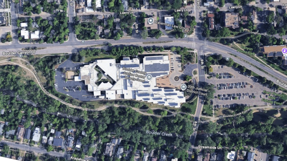 Aerial view of the Boulder County Justice Center between Canyon Blvd, 6th St and the Boulder Creek Path